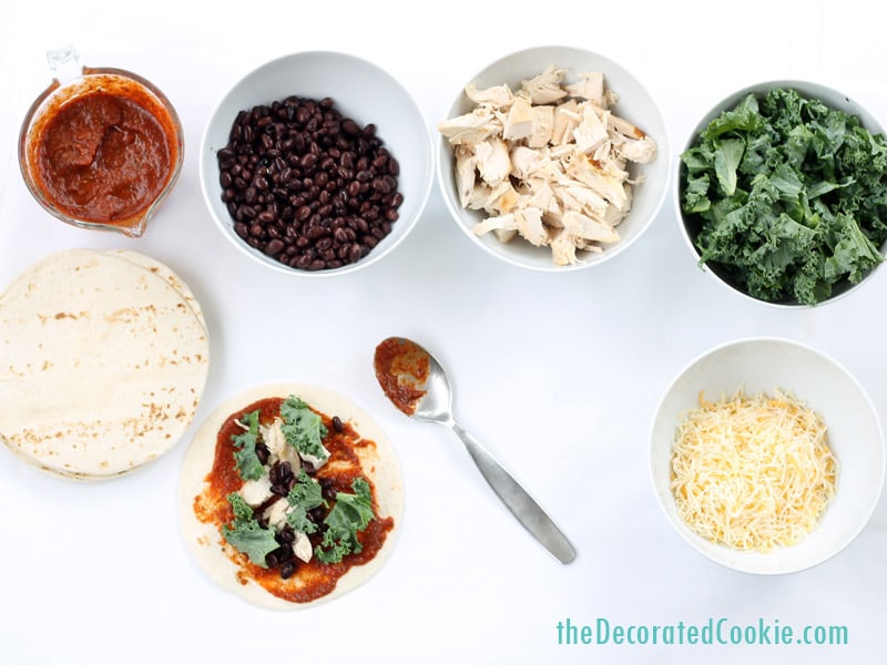 easy chicken and kale enchiladas with black beans, made with 1-minute enchilada sauce 