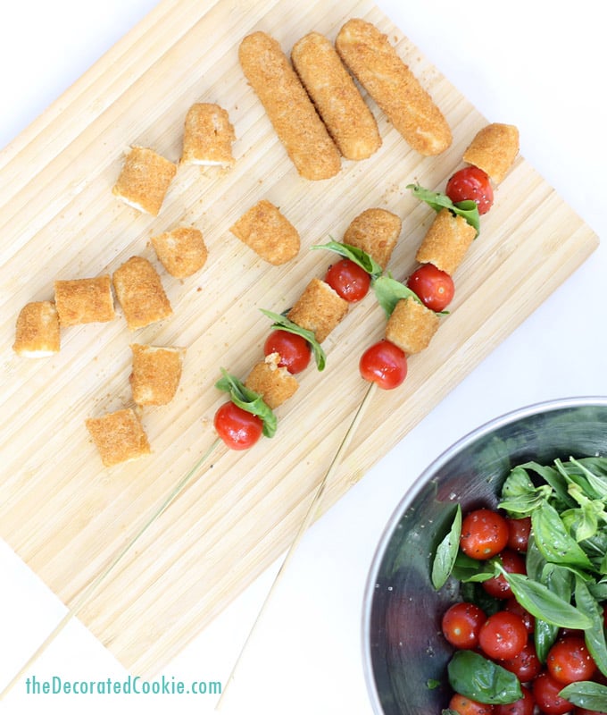 mozzarella stick caprese skewers - tomato, basil and Farm Rich mozzarella sticks