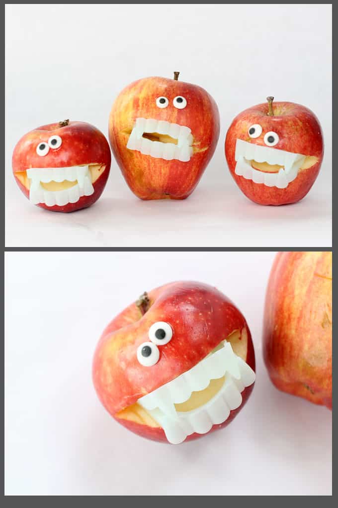 These super-easy monster apples take seconds to make for a fun Halloween party food idea or healthy Halloween snack idea for the classroom. Vampire apples! #halloween #healthyhalloween #partyfood #apples #monster #vampire #fruit 