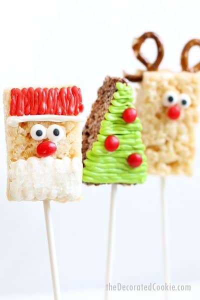 Christmas Rice Krispie Treats decorated with frosting. Santa, tree, Rudolph.
