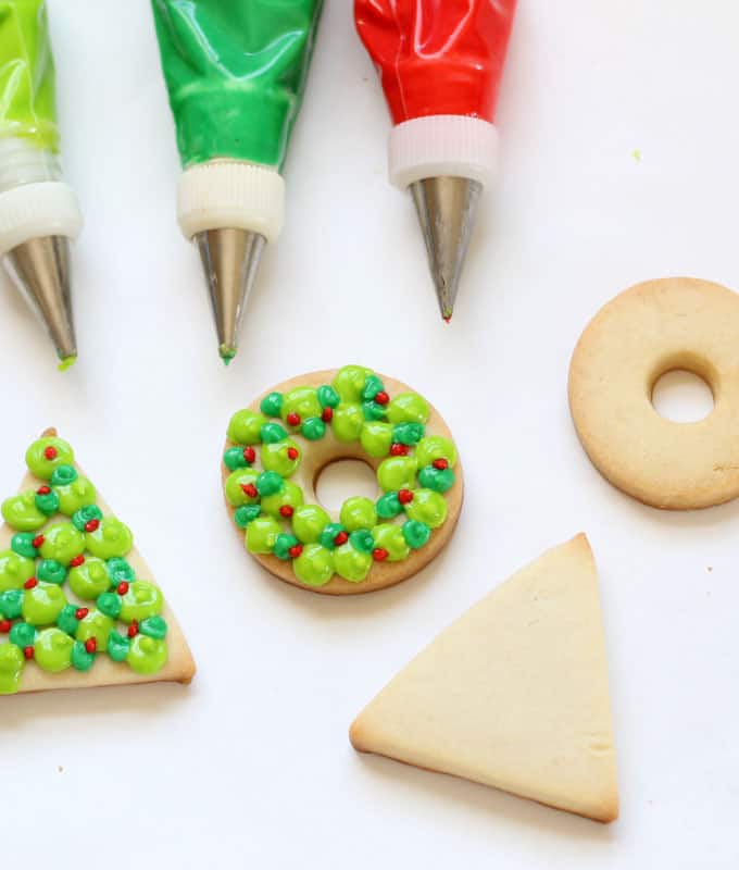 icing bags and decorated christmas cookies 