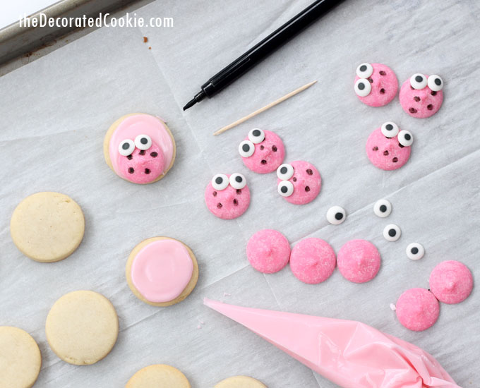 decorating love bug cookies for Valentine's Day