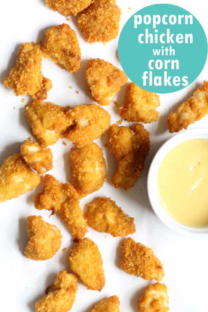 Truly the best baked popcorn chicken with corn flakes crumbs, video recipe included. Fantastic, easy weeknight dinner idea.
