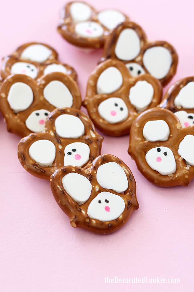 Easy Easter bunny pretzels made with pretzels, chocolate, and food writers. Video step-by-step instructions are included.