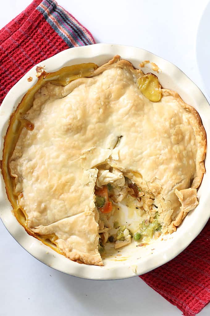Easy chicken pot pie recipe! Use rotisserie chicken and other shortcuts for this weeknight dinner. Video recipe included.
