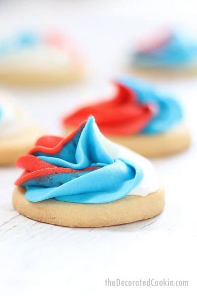 REd, white, and blue frosting swirl 4th of July cookies.
