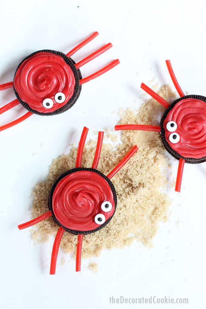 Oreo crabs with red candy melts and licorice legs