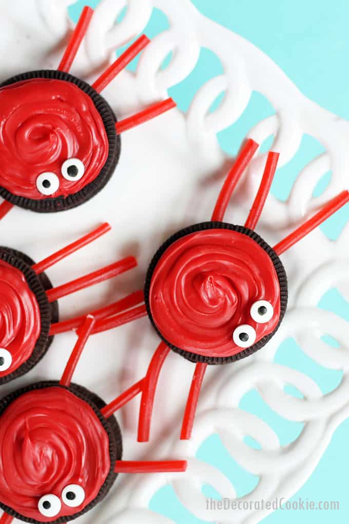 Oreo crabs with red candy melts and licorice legs
