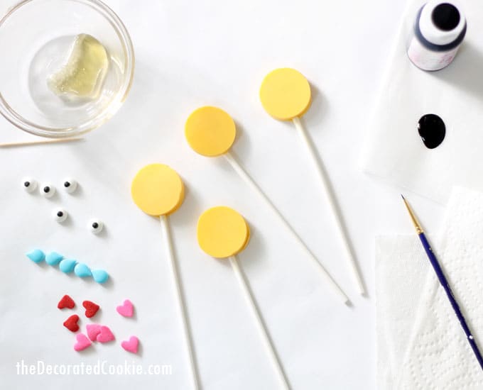 emoji party food idea: EASY chocolate emoji candy pops