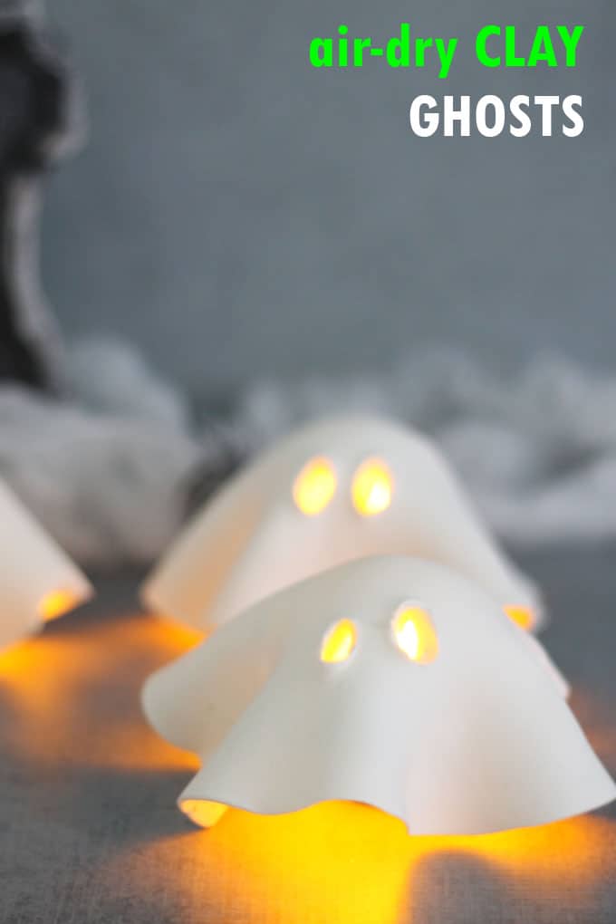 An easy air-dry clay ghost tea lights Halloween craft for a fun and easy Halloween decor idea. #halloween #crafts #Halloweencraft #airdryclay #ghosts #tealight 