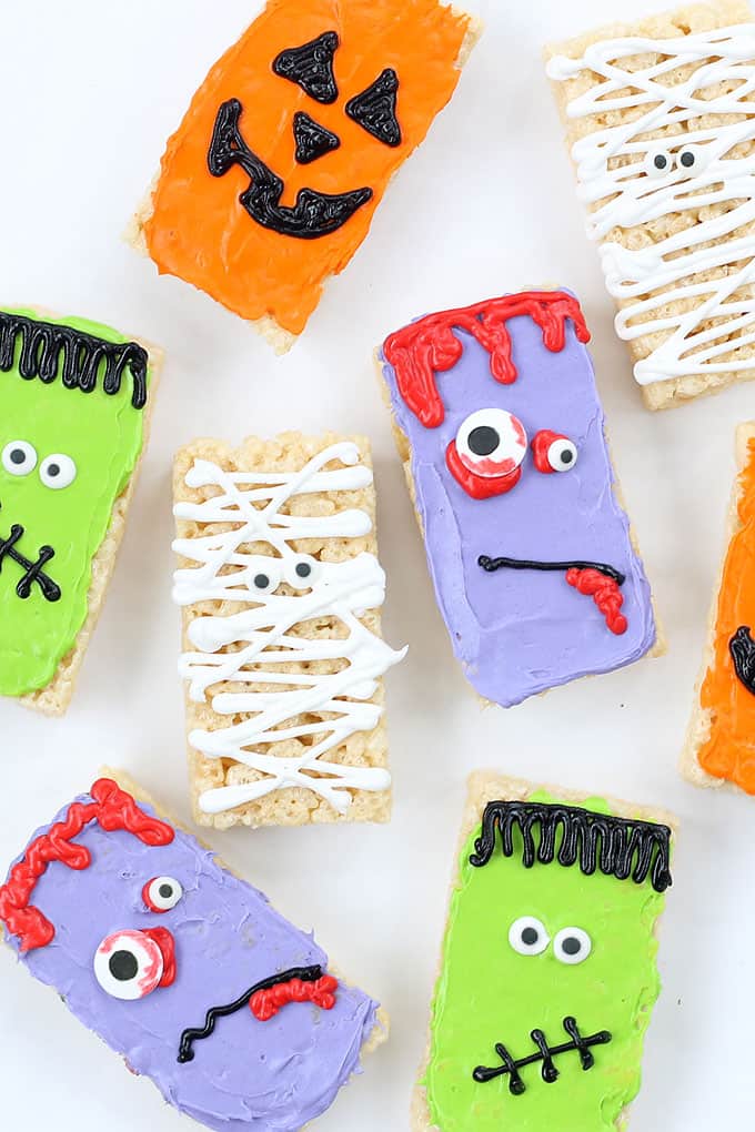 Quick and easy Halloween Rice Krispie Treats with store-bought cereal treats and frosting are a great addition to your Halloween party food. Try a Frankenstein, Jack O' Lantern, mummy, or zombie.  #halloween #partyfood #ricekrispietreats #cerealtreats #frankenstein #mummy #zombie #halloweentreats