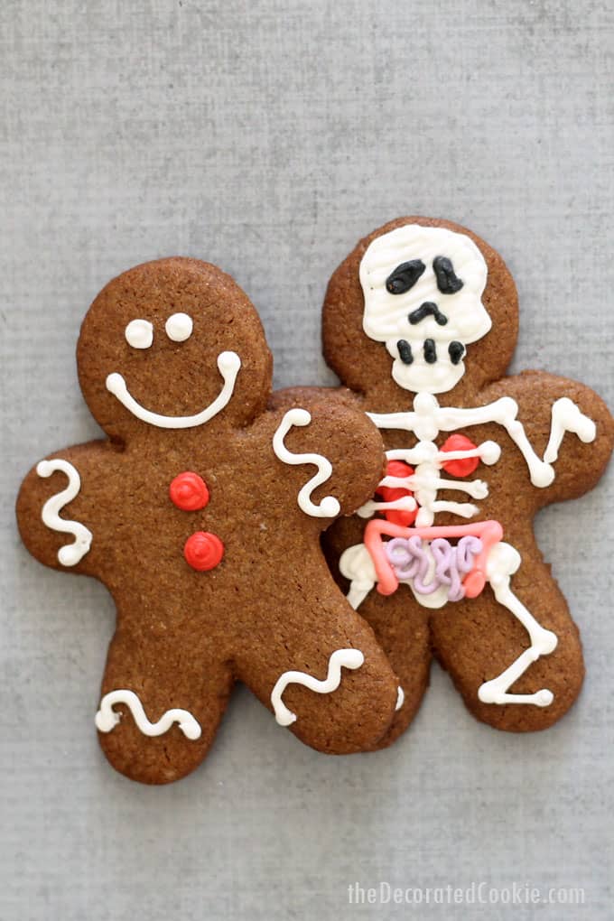 Halloween gingerbread man -- Traditional gingerbread man cookies hide skelton gingerbread cookies (with anatomy and all). Great Halloween cookies!!