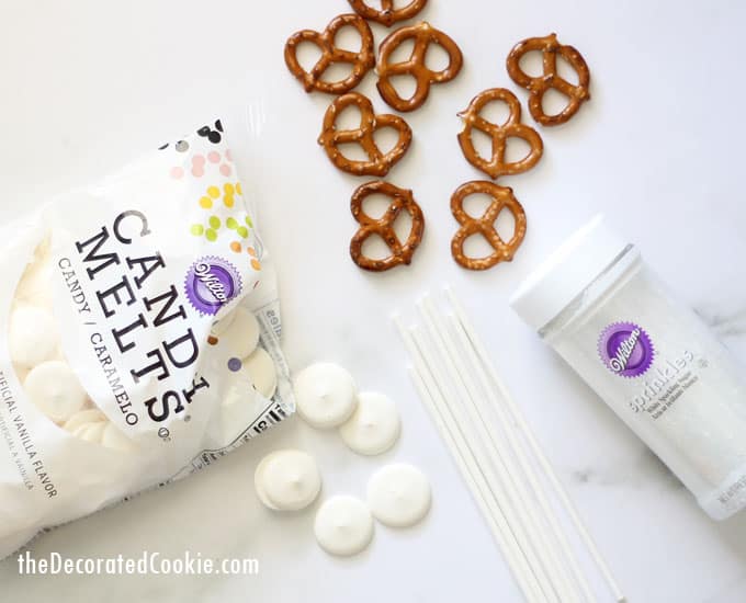 Easy snowflake pretzel pops, a cute and delicious fun food craft for Christmas and Winter. Video how-tos.