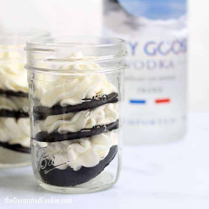 This vodka ice box cake in a jar is a delicious, no-bake, overnight dessert idea combining chocolate wafers, whipped cream, and vodka. Individual servings in a mason jar. Whipped cream vodka recipe.