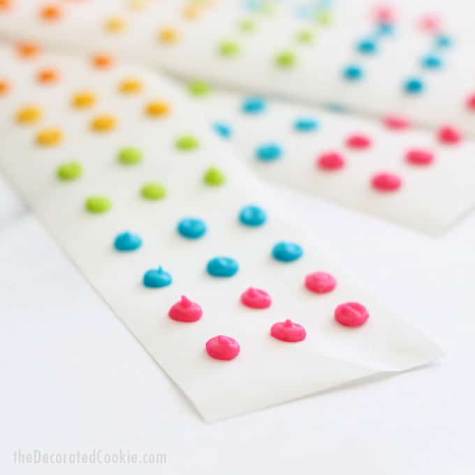 How to make retro homemade candy buttons with colorful royal icing, a copycat recipe of the traditional candy. Great rainbow and unicorn party food! Video how-tos. #RainbowFood #CandyButtons #RetroCandy #CandyDots #Homemade #CopycatRecipe