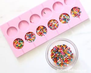 Easy sprinkle chocolate pops for birthday or rainbow parties.