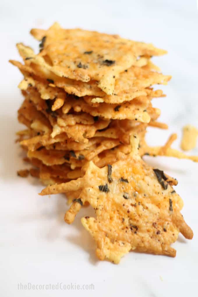 Parmesan crisps with herbs are an easy, low-carb, keto snack and appetizer. Made with only a few ingredients, shredded cheese, pepper, and sage. Video recipe. #ParmesanCrisps #LowCarb #Keto #snacks #appetizers #Cheese #Herbs 