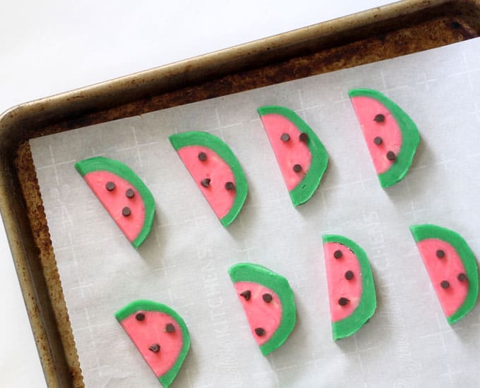 Watermelon slice cookies on baking tray