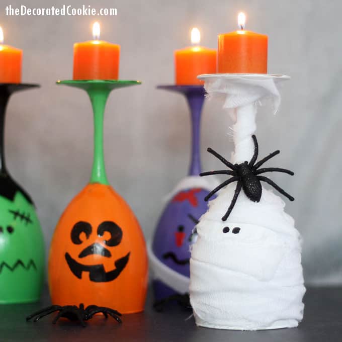 These Halloween wine glass candles are easy Halloween crafts to make for DIY Halloween decorations. Perfect for a Halloween party centerpiece. #halloween #wineglass #candles #diy #crafts #Halloweencrafts #HalloweenDecorations #DIY 