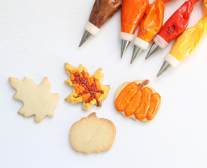 royal icing and cookies in fall colors 