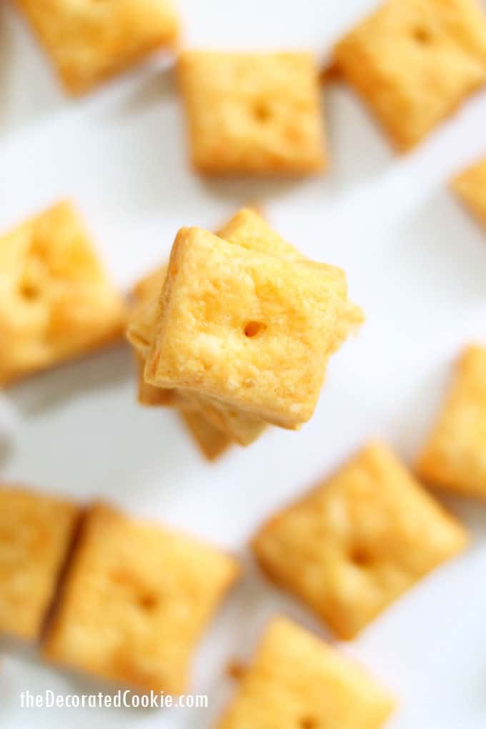 Homemade Cheez-its, filled with real cheddar cheese and baked to a crisp, are even better than the store-bought crackers. #homemade #crackers #storebought #copycat #snacks #cheezits #homemadecheezits #cheese