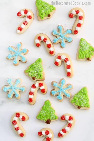 mini decorated Christmas cookies with royal icing and sprinkles