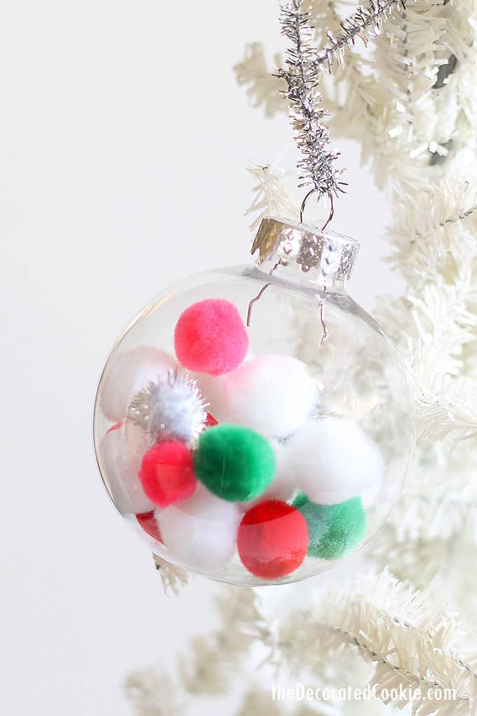 CHRISTMAS ORNAMENT CRAFTS: Easy pipe cleaner ornaments and pom pom baubles that kids can make! Great classroom Christmas crafts for kids. #christmas #ChristmasCrafts #kidscrafts #Christmascraftsforkids #diyornaments #pipecleanerornaments #christmastree #candycane 