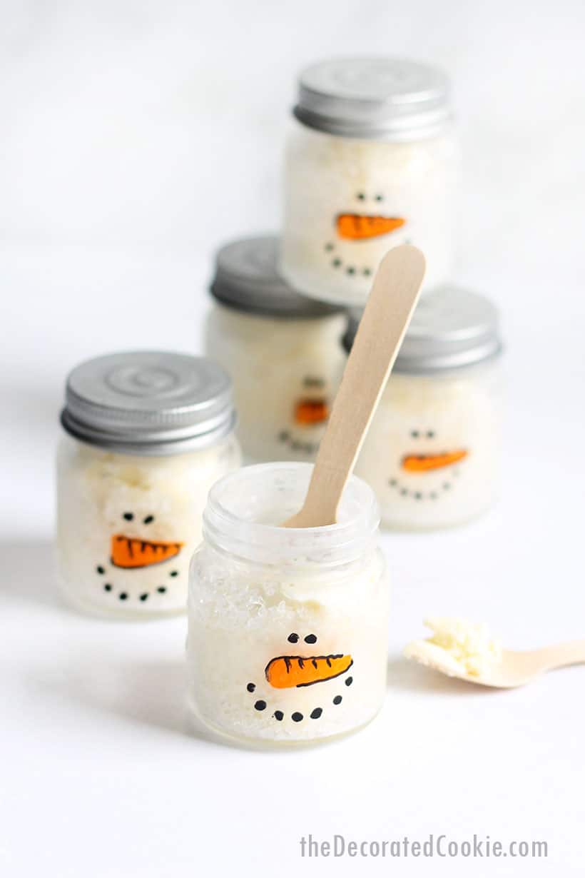 mini mason jars painted as snowmen with ice cream and sprinkles 