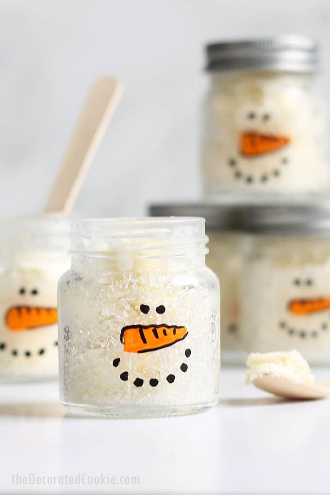 SNOWMAN ICE CREAM IN JARS -- Mini mason jars filled with vanilla ice cream and sprinkles with snowman faces. Adorable winter treat idea. Video.