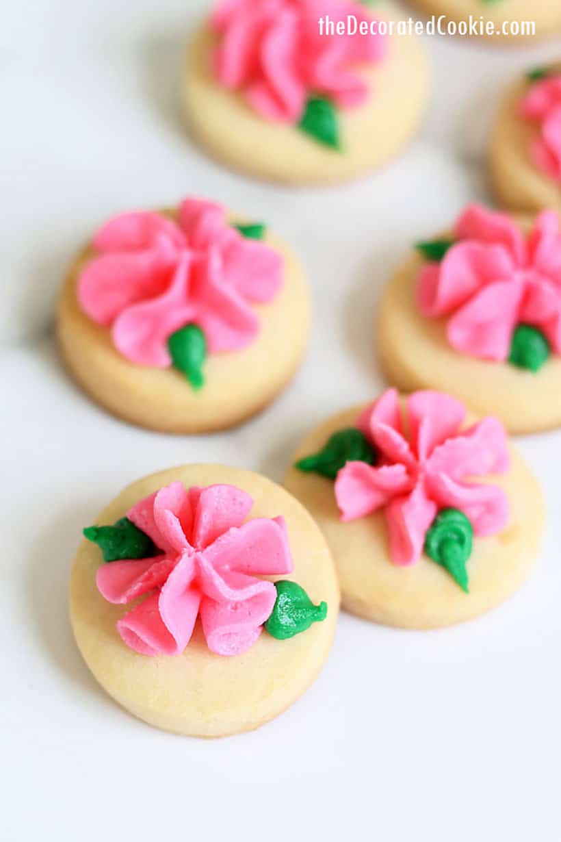 Mini rose cookies decorating with buttercream frosting for Valentine's Day 