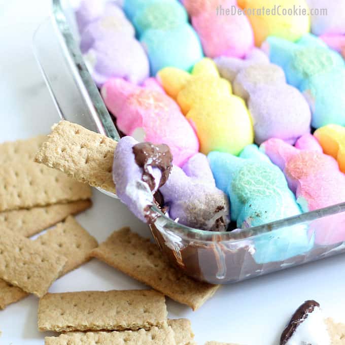 EASTER PEEPS S'MORES DIP is an easy, 2-ingredient Easter dessert. Chocolate chips and Peeps marshmallow bunnies with graham crackers and pretzels. Video.