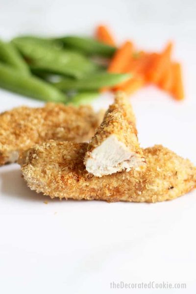 WHEAT GERM CHICKEN BREAST RECIPE -- healthy dinner idea for picky eaters and kids! Avocado and wheat germ baked "breaded" chicken strips.