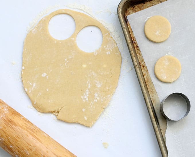 cutting out cookie dough 