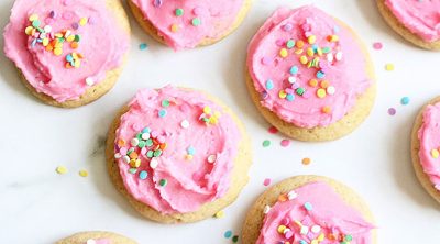 soft cookies with pink frosting and sprinkles
