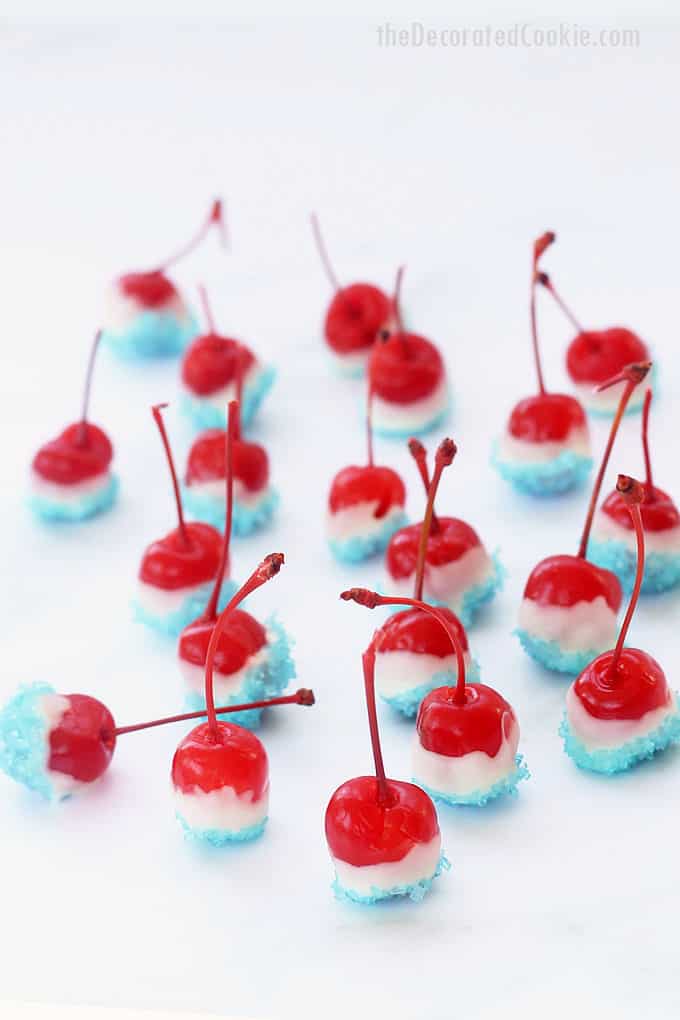 a bunch of red, white, and blue boozy cherry bombs with white background 