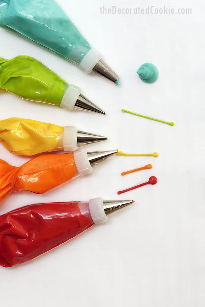 decorating bags filled with colorful royal icing