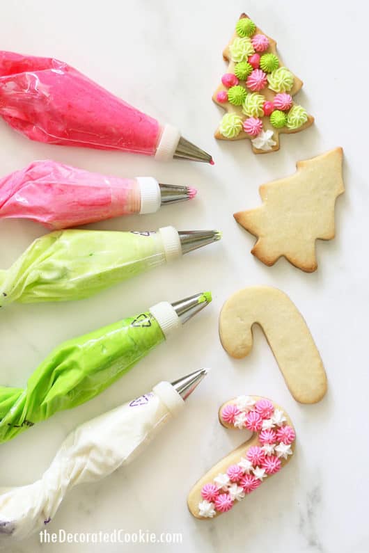 CHRISTMAS COOKIES with FROSTING Piped, pastel cookies.
