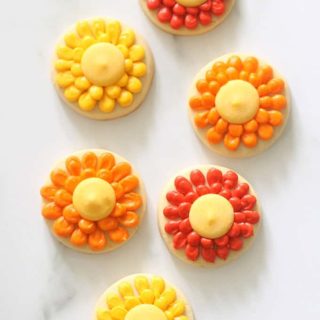 overhead image of piped flower cookies for fall