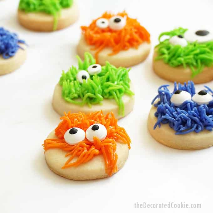 fuzzy monster Halloween cookies with white background