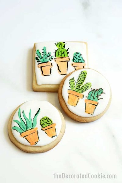 overhead image of painted succulent cookies