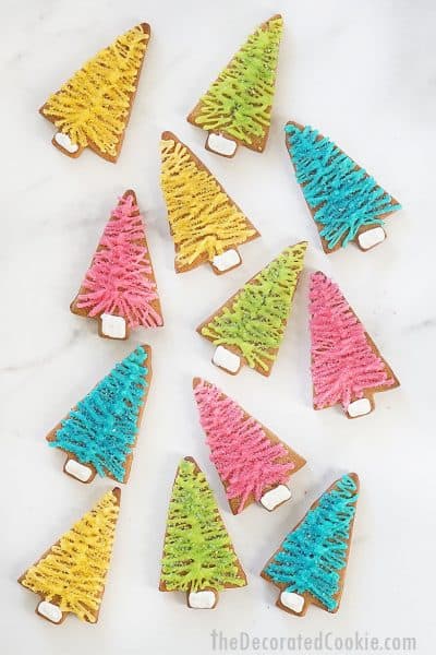 gingerbread Christmas cookies decorated like bottle brush Christmas trees