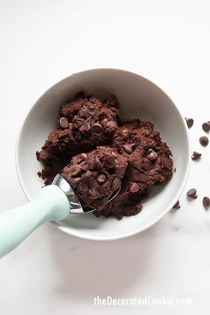 finished edible brownie batter in a bowl with ice cream scoop 