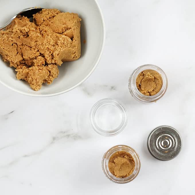 edible gingerbread cookie dough in bowl and jars 