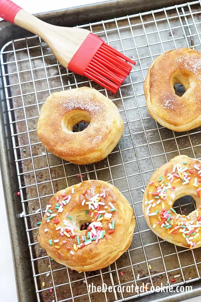 air fryer donuts on baking tray with sprinkles 
