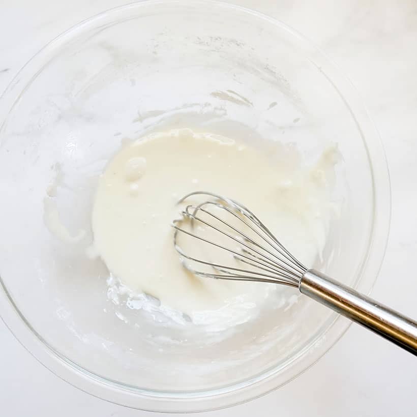 mixing easy icing for cookie decorating 